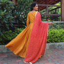 mustard yellow gown with bandhani dupatta