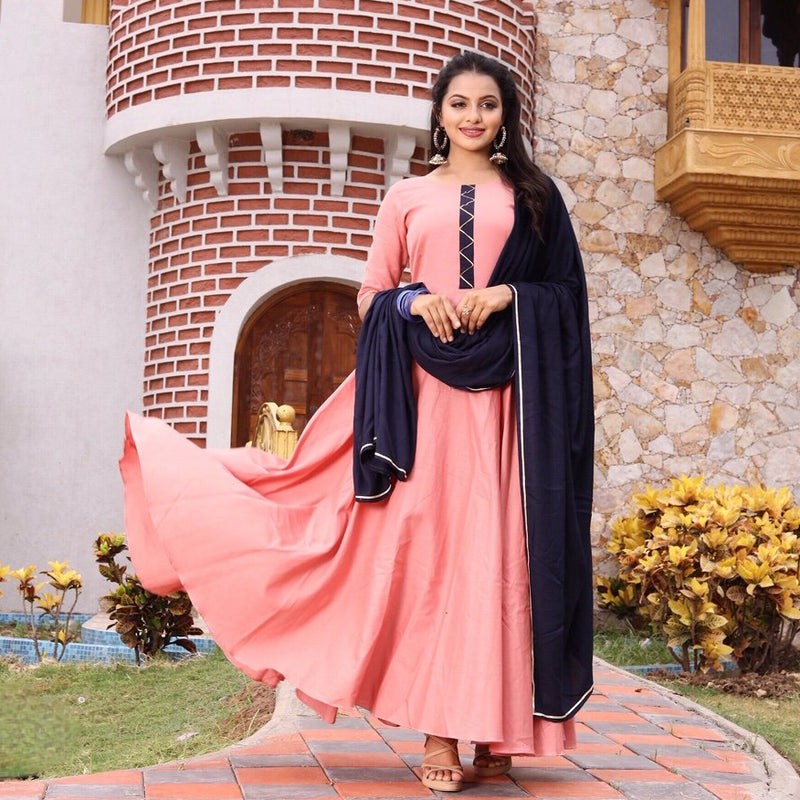 Peach cotton party wear gown with sleeves.