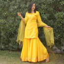 yellow kurta sharara set with net dupatta